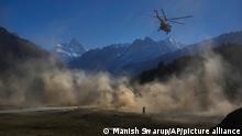 A helicopter carrying Indian army soldiers takes off during Indo-US joint exercise or Yudh Abhyas, in Auli, in the Indian state of Uttarakhand, Tuesday, Nov. 29, 2022. Militaries from India and the U.S. are taking part in a high-altitude training exercise in a cold, mountainous terrain close to India's disputed border with China. The training exercise began two weeks ago. India's defence ministry statement said the joint exercise is conducted annually with the aim of exchanging best practices, tactics, techniques and procedures between the armies of the two nations, which is under Chapter of the UN Mandate. (AP Photo/Manish Swarup)