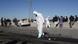 A member of a crime scene unit surveys the site after a suicide bomb blast on a police patrol in Quetta on November 30, 2022 A member of a crime scene unit surveys the site after a suicide bomb blast on a police patrol in Quetta on November 30, 2022