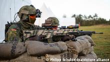 Bundeswehr Soldiers in training with machine guns