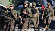 Soldiers arrive in Soyapango, El Salvador, Saturday, Dec. 3, 2022. The government of El Salvador sent 10,000 soldiers and police to seal off Soyapango, on the outskirts of the nationâ€™s capital Saturday to search for gang members. (AP Photo/Salvador Melendez)