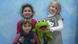 Kids holding stuffed frog Kids holding stuffed frog