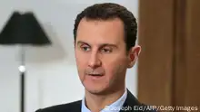 ARCHIV: TOPSHOT - Syrian President Bashar al-Assad gestures during an exclusive interview with AFP in the capital Damascus on February 11, 2016. (Photo by JOSEPH EID / AFP) (Photo by JOSEPH EID/AFP via Getty Images)