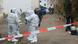 Forensics experts from the Ulm Police, dressed in safety gear, inspect a crime scene in Illerkirchberg, Germany Forensics experts from the Ulm Police, dressed in safety gear, inspect a crime scene in Illerkirchberg, Germany