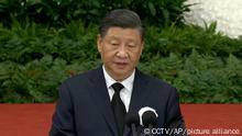 In this image taken from video footage run by China's CCTV, Chinese President Xi Jinping speaks during a formal memorial for the late former Chinese President Jiang Zemin at the Great Hall of the People in Beijing on Tuesday, Dec. 6, 2022. (CCTV via AP)