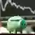 A small piggy bank is seen in the Frankfurt stock exchange