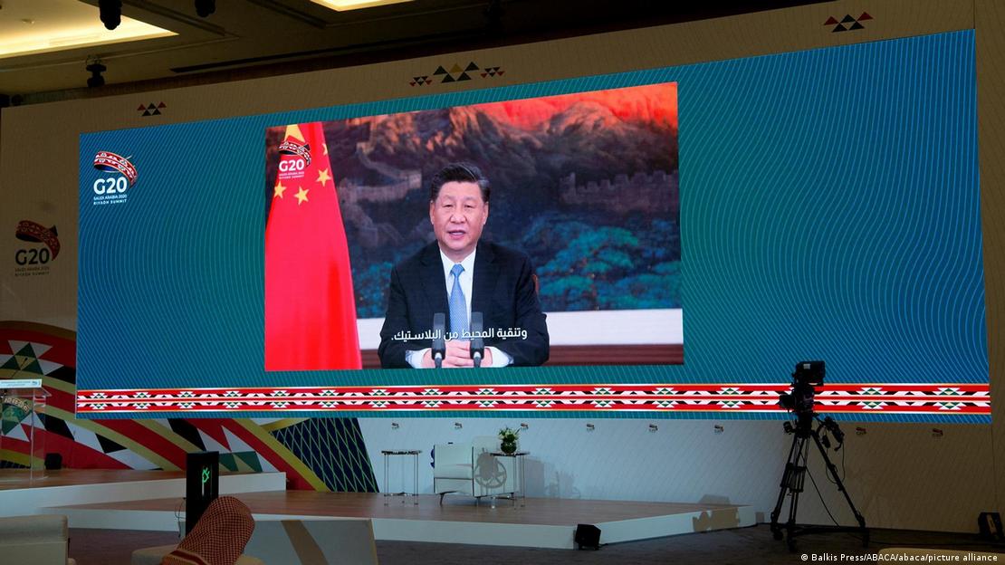 Chinese president Xi Jinping seen on a screen from the media centre during the G20 virtual summit, in Saudi Arabia in 2020.