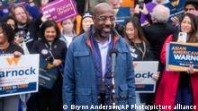 Democratic Sen. Raphael Warnock speaks during an election day canvass launch on Tuesday, Dec. 6, 2022, in Norcross, Ga. Sen. Warnock is running against Republican candidate Herschel Walker in a runoff election. (AP Photo/Brynn Anderson)