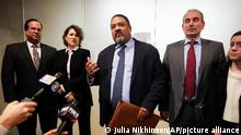 Manhattan District Attorney Alvin Bragg, center, surrounded by his legal team, speaks to the media after the jury found the Trump Organization guilty on all counts in a criminal tax fraud case, Tuesday, Dec. 6, 2022, in New York. (AP Photo/Julia Nikhinson)