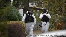 German special police forces stand guard and patrol in a neighbourhood in south western Berlin on December 7, 2022 as part of nationwide early morning raids against members of a far-right terror group suspected of planning an attack on parliament. - More than 3,000 officers including elite anti-terror units took part in the early morning raids and searched more than 130 properties, in what German media described as one of the largest police actions the country has ever seen. The raids targeted alleged members of the Citizens of the Reich (Reichsbuerger) movement suspected of having made concrete preparations to violently force their way into the German parliament with a small armed group, prosecutors said in a statement. (Photo by Tobias SCHWARZ / AFP) (Photo by TOBIAS SCHWARZ/AFP via Getty Images)