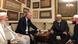 Turkey's president Erdogan sitting on a couch with a low table in front of him, he is surrounded by three religous leaders, also seated on the L shaped couch Turkey's president Erdogan sitting on a couch with a low table in front of him, he is surrounded by three religous leaders, also seated on the L shaped couch