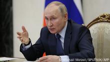 Russian President Vladimir Putin holds the annual meeting of the Presidential Council for Civil Society and Human Rights, via video conference, in Moscow on December 7, 2022. (Photo by Mikhail Metzel / SPUTNIK / AFP) / *Editor's note : this image is distributed by Russian state owned agency Sputnik.*