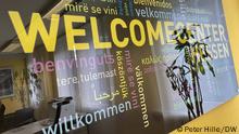 Hinweisschild Welcome Center Hessen für Fachkräfte aus dem Ausland in Frankfurt.