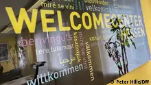 Hinweisschild Welcome Center Hessen für Fachkräfte aus dem Ausland in Frankfurt.