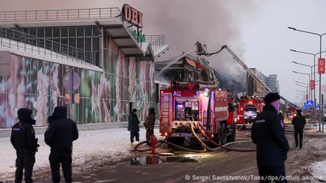 Firefighters battle a fire that hit a hypermarket of the OBI home improvement and gardening retailer at the Mega Khimki shopping mall