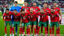 Morocco team players pose prior to the start of the World Cup quarterfinal soccer match between Morocco and Portugal, at Al Thumama Stadium in Doha, Qatar, Saturday, Dec. 10, 2022. (AP Photo/Petr David Josek)