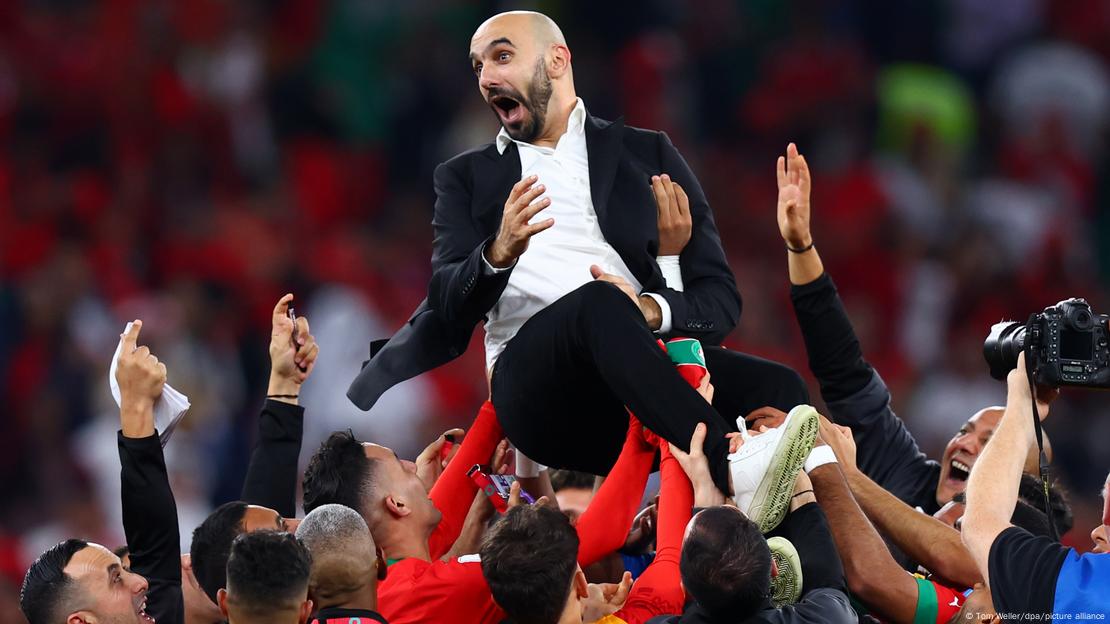 Morocco coach Walid Regragui celebrates beating Portugal at the FIFA World Cup 2022