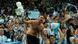 A topless Argentina fan celebrates after Argentina defeated the Netherlands off penalties during the World Cup quarterfinal soccer match between the Netherlands and Argentina, at the Lusail Stadium in Lusail, Qatar, Saturday, Dec. 10, 2022.