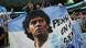 Fans of Argentina shows a flag with the portrait of Diego Maradona after the Quarterfinal between the Netherlands and Argentina