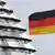 The German flag on top of the German parliament "Reichstag" in the capital Berlin