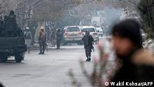Taliban security forces arrive at the site of an attack at Shahr-e-naw which is city's one of main commercial areas in Kabul on December 12, 2022. - A loud blast and gunfire were heard in the Afghan capital December 12 near a guest house popular with Chinese business visitors, a witness said. (Photo by Wakil KOHSAR / AFP)