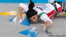 A handout picture provided by the International Federation of Sport Climbing (IFSC) shows Iranian climber Elnaz Rekabi competing during the women boulder finals of the Asian Championships of the IFSC in Seoul, South Korea. - Alarm grew on October 18, 2022 over the wellbeing of Iranian sports climber Elnaz Rekabi after she competed at an event in South Korea without a hijab in what some saw as a gesture of solidarity with the women-led protests at home. Rekabi, 33, in her first comment since the event on October 16 apologised on Instagram for the concerns caused and insisted that her bare-headed appearance had been unintentional. She had come fourth representing Iran in the boulder and lead combined event at the Asian Championships in Seoul. (Photo by Rhea KANG / INTERNATIONAL FEDERATION OF SPORT CLIMBING / AFP) / == RESTRICTED TO EDITORIAL USE - MANDATORY CREDIT AFP PHOTO / HO /International Federation of Sport Climbing - NO MARKETING NO ADVERTISING CAMPAIGNS - DISTRIBUTED AS A SERVICE TO CLIENTS ==