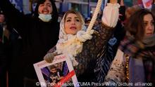 December 11, 2022, Paris, Ile de France, FRANCE: A woman holding a noose around her neck participates in a march in Paris to denounce the Islamic regime in Iran. Mohsen Shekari was the first Iranian to be excecuted on Thursday, december 8th 2022 by the increasingly repressive Iranian regime for participating in protests with more facing the death penalty on similar charges. (Credit Image: Â© Remon Haazen/ZUMA Press Wire