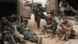 Chris Tomlinson, right, of the Associated Press, eats a "meal ready to eat," or MRE, at a temporary camp in the desert with U.S. Army soldiers from the A Company 3rd Battalion, 7th Infantry Regiment about 100 miles south of Baghdad March 24, 2003. Tomlinson was among journalists "embedded" with the troops during the war in Iraq. (AP Photo/John Moore) Chris Tomlinson, right, of the Associated Press, eats a "meal ready to eat," or MRE, at a temporary camp in the desert with U.S. Army soldiers from the A Company 3rd Battalion, 7th Infantry Regiment about 100 miles south of Baghdad March 24, 2003. Tomlinson was among journalists "embedded" with the troops during the war in Iraq. (AP Photo/John Moore)