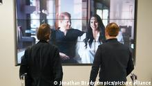 Duke and Duchess of Sussex Netflix documentary. Office workers in London, watching the Duke and Duchess of Sussex's controversial documentary being aired on Netflix. Harry & Meghan - a six-part docuseries - dropped on the streaming giant at 8am in the UK on Thursday, with the royal family steeling themselves for the revelations in the first three episodes. Picture date: Thursday December 8, 2022. See PA story ROYAL Sussex. Photo credit should read: Jonathan Brady/PA Wire URN:70159501