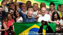 Former Brazilian President Luiz Inacio Lula da Silva celebrates after the electoral authority said the defeated incumbent Jair Bolsonaro to become the country's next president, in Sao Paulo, Brazil, Sunday, Oct. 30, 2022. (AP Photo/Andre Penner)