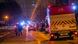Police cars and firefighters cordon off area Police cars and firefighters cordon off area