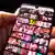 A smartphone screen showing many images of pornographic content, blurred