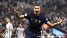 LUSAIL CITY, QATAR - DECEMBER 18: Kylian Mbappe of France celebrates after scoring the team's second goal during the FIFA World Cup Qatar 2022 Final match between Argentina and France at Lusail Stadium on December 18, 2022 in Lusail City, Qatar. (Photo by Catherine Ivill/Getty Images)
