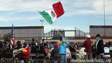 Migrants participate in a binational mass in memory of the many migrants who have died trying to cross the border between Mexico and the US celebrated at the Rio Bravo (Rio Grande in the US) in Ciudad Juarez, Chihuahua state, Mexico, on November 5, 2022. - On a wooden platform on the Rio Bravo, bishops from Mexico and the United States celebrated a mass this Saturday in memory of the many migrants who have died trying to cross the border between the two countries fleeing poverty. (Photo by HERIKA MARTINEZ / AFP)