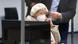 Former Nazi death camp secretary Irmgard F. with face mask Former Nazi death camp secretary Irmgard F. with face mask