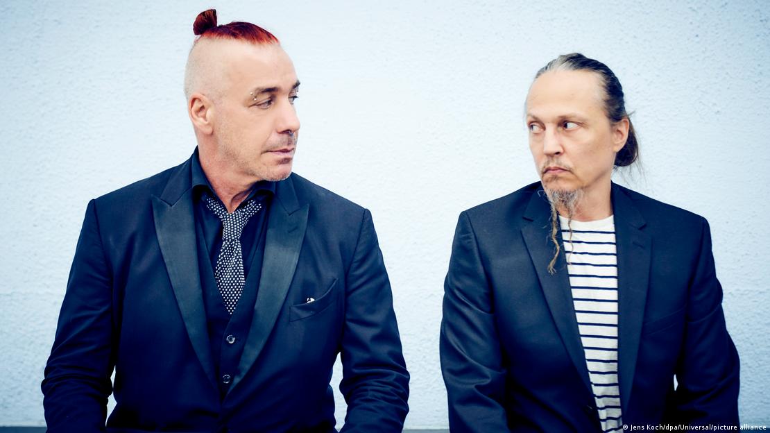 Till Lindemann and Peter Tägtgren look at one another.