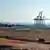 A view over Berbera Port from the distance with gantry cranes