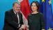 German Foreign Minister Annalena Baerbock shakes hands with Danish Foreign Minister Lars Lokke Rasmussen in Berlin in front of Danish and EU flags German Foreign Minister Annalena Baerbock shakes hands with Danish Foreign Minister Lars Lokke Rasmussen in Berlin in front of Danish and EU flags