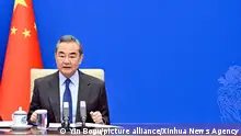 (221220) -- BEIJING, Dec. 20, 2022 (Xinhua) -- Chinese State Councilor and Foreign Minister Wang Yi, also a member of the Political Bureau of the Communist Party of China (CPC) Central Committee, meets with French Foreign Affairs Minister Catherine Colonna via video link, Dec. 19, 2022. (Xinhua/Yin Bogu)