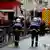 رجال شرطة فرنسيون في موقع إطلاق النار بباريس