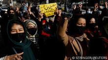 Afghan women chant slogans in protest against the closure of universities to women by the Taliban in Kabul, Afghanistan, December 22, 2022. REUTERS/Stringer