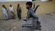 An Afghan National policeman gathers his belongings as he prepares to leave for an overnight operation near the town of Golestan in Afghanistan's Farah Province June 13, 2009. In announcing his new Afghan policy, President Barack Obama said strengthening local security forces was a priority. The administration is aiming for a trained, equipped and professional force of 82,000 police by the end of 2011. (AP Photo/David Guttenfelder) An Afghan National policeman gathers his belongings as he prepares to leave for an overnight operation near the town of Golestan in Afghanistan's Farah Province June 13, 2009. In announcing his new Afghan policy, President Barack Obama said strengthening local security forces was a priority. The administration is aiming for a trained, equipped and professional force of 82,000 police by the end of 2011. (AP Photo/David Guttenfelder)