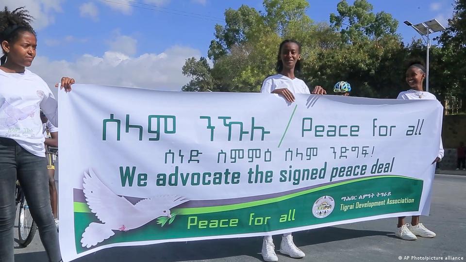 Girls hold a banner in support of the recent peace deal agreed between the Ethiopian federal government and Tigray forces