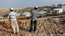 Israeli settler boys stand on a hill overlooking the illegal Jewish settlement Givat Asaf in the West Bank near Ramallah, October 27, 2011. The Givat Asaf settlement is slated to be demolished by the Israeli government by year's end. UPI/Debbie Hill Photo via Newscom picture alliance