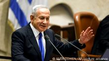 Israeli Prime Minister-designate Benjamin Netanyahu speaks during a special session of the Knesset, Israel's parliament, to approve and swear in a new right-wing government, in Jerusalem Thursday, Dec. 29, 2022. Netanyahu was set to return to office Thursday at the helm of the most religious and ultranationalist government in Israel’s history, vowing to implement policies that could cause domestic and regional turmoil and alienate the country’s closest allies.(Amir Cohen/Pool Photo via AP)