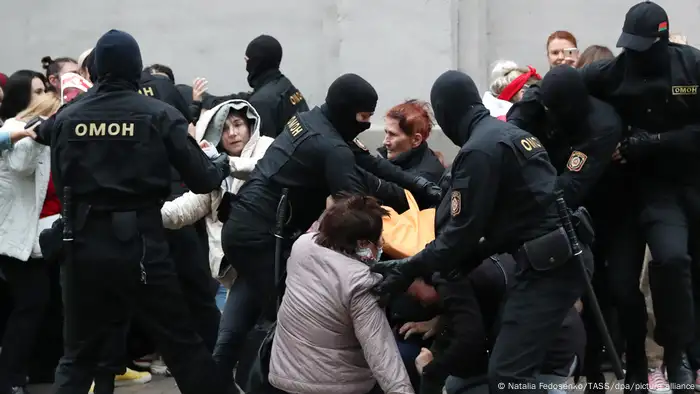 MINSK, BELARUS - SEPTEMBER 8, 2020: Law enforcement officers detain participants in a march held by opposition activists from the Komarovsky market to Independence Avenue in support of Maria Kolesnikova and other coordination council members.