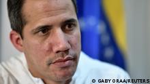 Venezuelan opposition leader Juan Guaido speaks during an interview with Reuters, in Caracas, Venezuela, December 6, 2022. REUTERS/Gaby Oraa