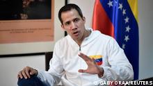 FILE PHOTO: Venezuelan opposition leader Juan Guaido speaks during an interview with Reuters, in Caracas, Venezuela, December 6, 2022. REUTERS/Gaby Oraa/File Photo
