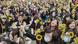 Young protesters hold up small sunflowers during the 2014 protests Young protesters hold up small sunflowers during the 2014 protests