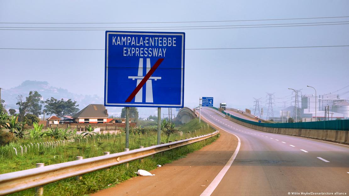 A sign along a highway marking the Kampala-Entebbe Expressway