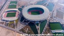 This aerial photo shows the New Minaa Olympic Stadium, built to accommodate 30,000 spectators, in Basra, Iraq, Tuesday, Dec. 27, 2022. (AP Photo/Nabil al-Jurani)